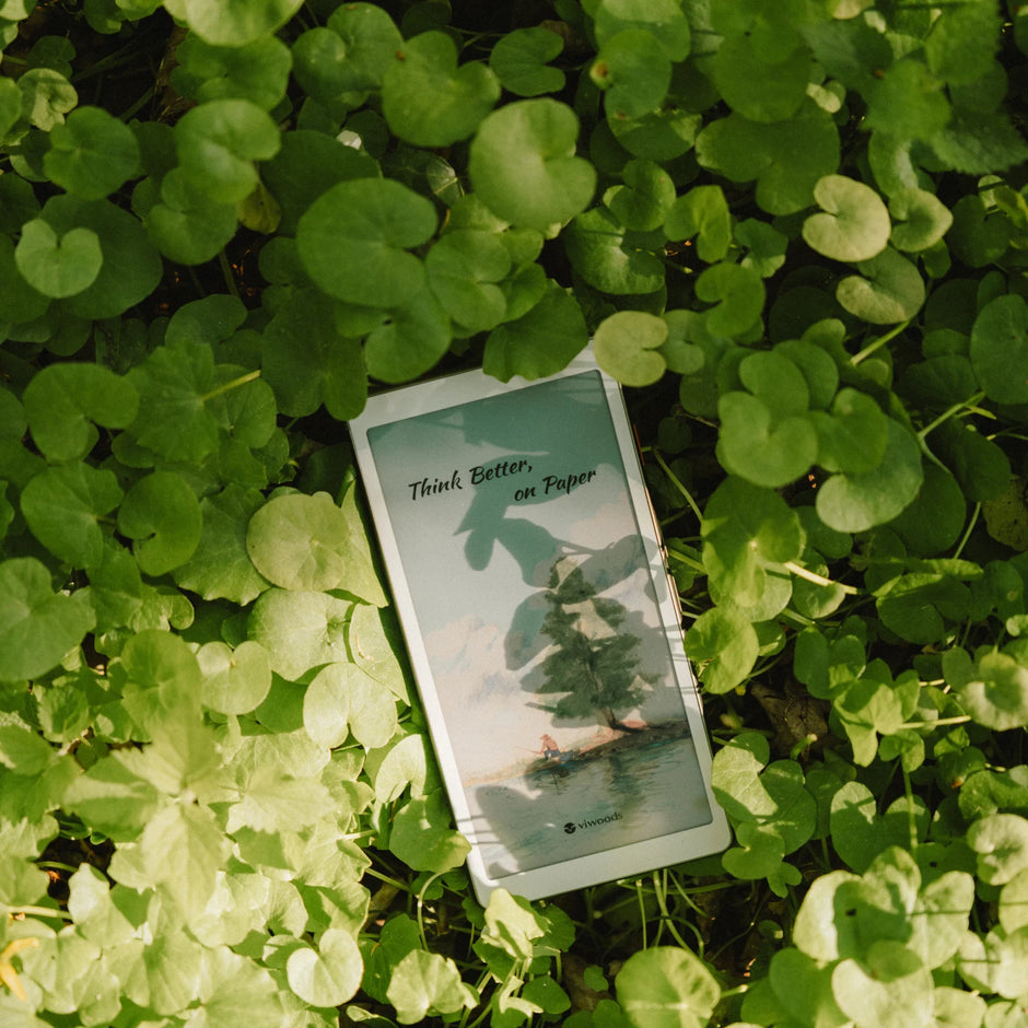 viwoods aipaper reader C with a nature-themed app on a bed of green leaves