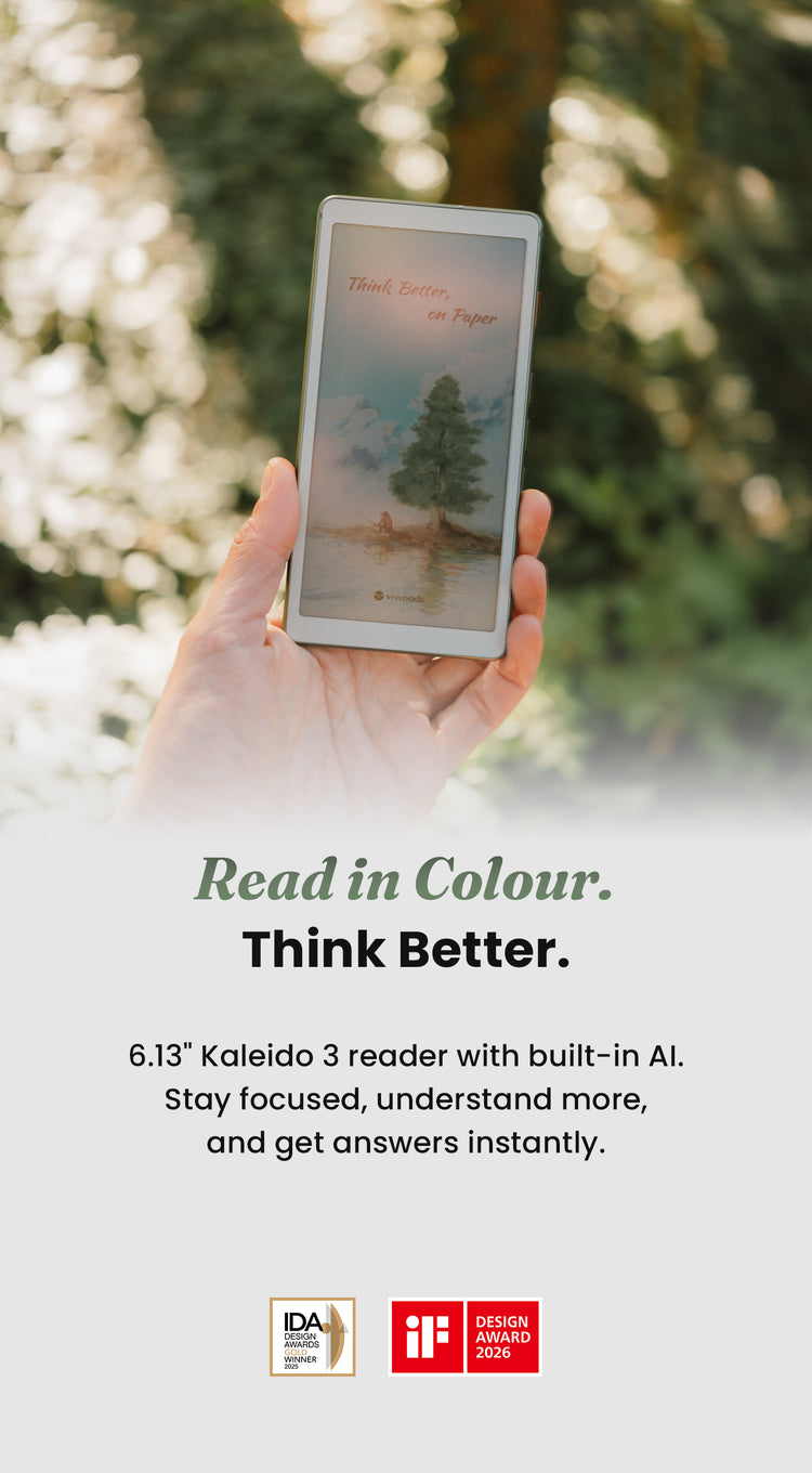 Hand holding a viwoods digital reader with a scenic cover against a blurred natural background